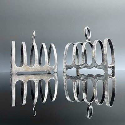 Lot 62 - Two silver hallmarked four section toast racks,...