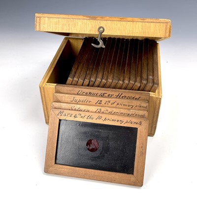 Lot 79 - Twenty-one wood framed magic lantern slides of...