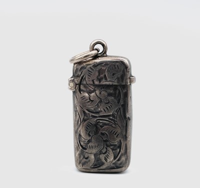 Lot 221 - A Victorian silver foliate engraved vesta case,...