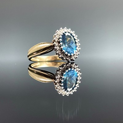 Lot 719 - A modern 9ct hallmarked gold blue topaz and...