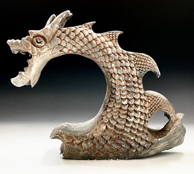 Lot 192 - A painted plaster cast head of a mythical...