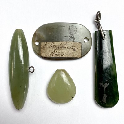 Lot 207 - Four jadeite pendants, the longest 46mm.
