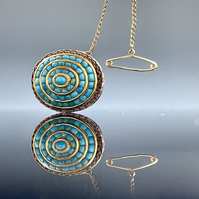 Lot 754 - A Victorian turquoise set oval target brooch,...