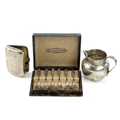 Lot 183 - A George V silver ovoid cream jug, Birmingham...