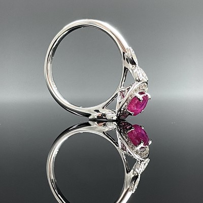 Lot 701 - A modern 18ct white gold, ruby and diamond...