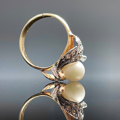 Lot 707 - A gold plated clear stone and cultured pearl...