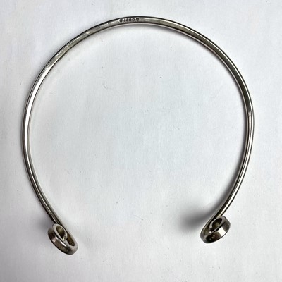 Lot 895 - A modern silver torque, London 2002, width...