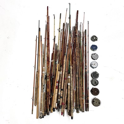 Lot 177 - A collection of various fishing rods and reels,...