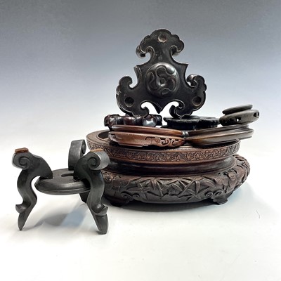 Lot 542 - A large Chinese carved hardwood stand, 19th century,.