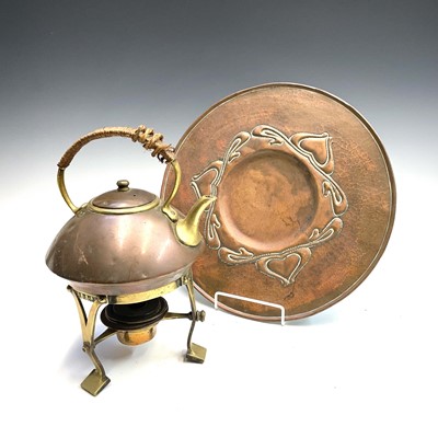 Lot 115 - An Arts and Crafts circular copper tray,...