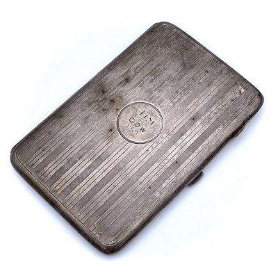 Lot 110 - A George V silver engine turned cigarette case,...