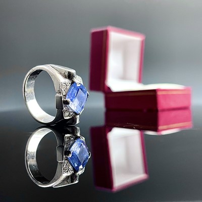 Lot 729 - A good modern platinum cornflower sapphire and...
