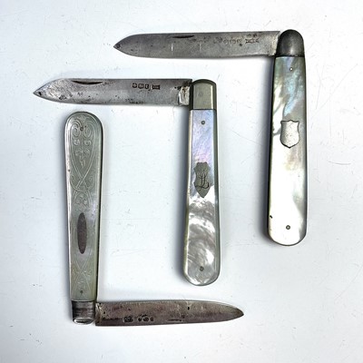 Lot 204 - Three mother of pearl folding fruit knives...