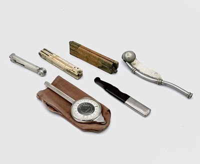 Lot 206 - A 19th century bone folding 12 inch ruler, a...