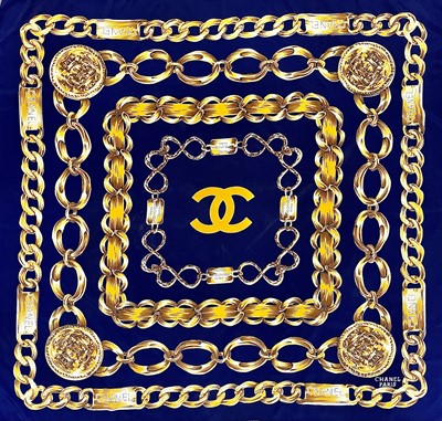 Lot 1030 - A Chanel printed silk scarf, 87cm square.