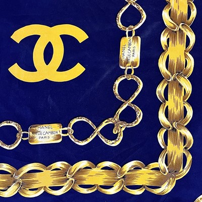Lot 1030 - A Chanel printed silk scarf, 87cm square.