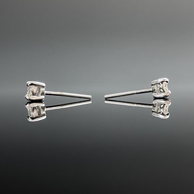 Lot 790 - A pair of white gold diamond set single stone...
