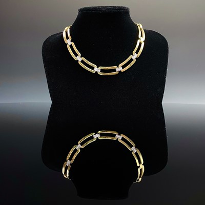 Lot 737 - A modern 18ct hallmarked bi-colour gold...
