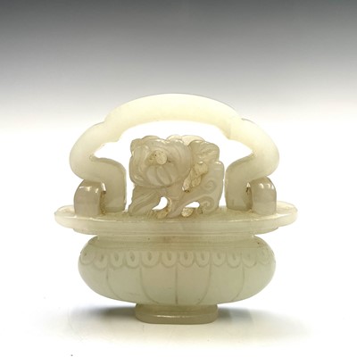 Lot 54 - A Chinese jade-type pendant in the form of a...