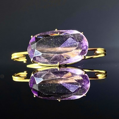 Lot 716 - A high purity gold amethyst set brooch, the...