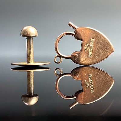 Lot 668 - A 9ct hallmarked gold padlock clasp; together...