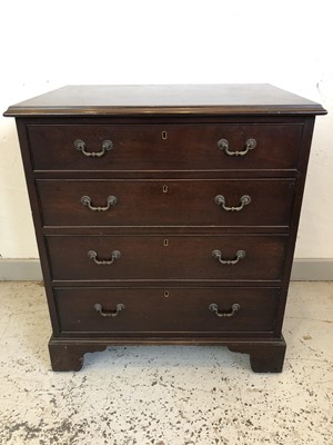 Lot 3087 - A 19th century mahogany low chest of four...