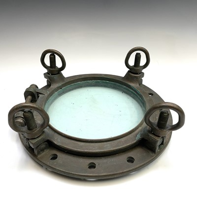 Lot 105 - A brass ships porthole, diameter 35cm.