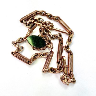 Lot 692 - A 9ct rose gold fancy link Albert watch chain,...