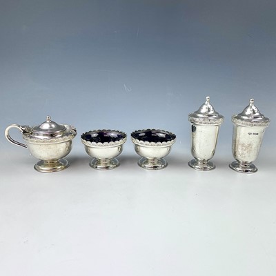 Lot 122 - A George V silver five piece cruet set by...
