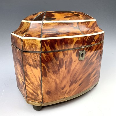 Lot 24 - An early Victorian bow front tortoiseshell tea...