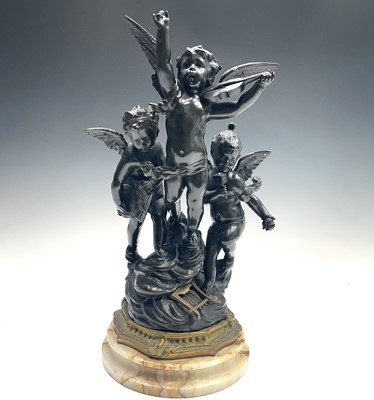 Lot 85 - After Rousseau, a bronzed metal group of three...