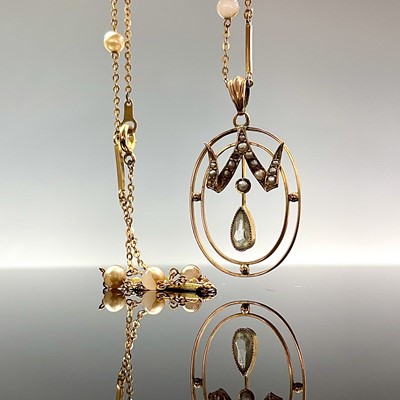 Lot 727 - A 9ct pearl and aquamarine set openwork...