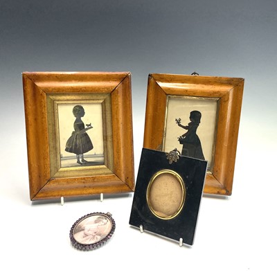 Lot 32 - An early 19th century silhouette, of a young...