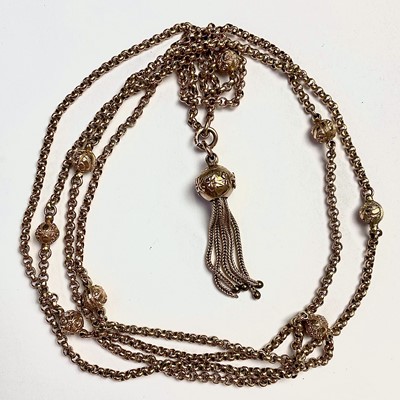 Lot 695 - A 9ct gold belcher link long guard chain,...