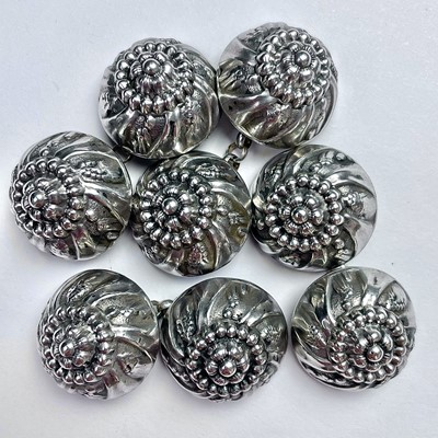 Lot 201 - A set of four Continental silver cloak buttons,...