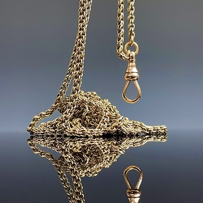 Lot 663 - A 9ct gold fancy link long guard chain, length...