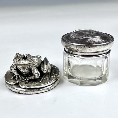 Lot 218 - A modern silver frog on a lily pad small...