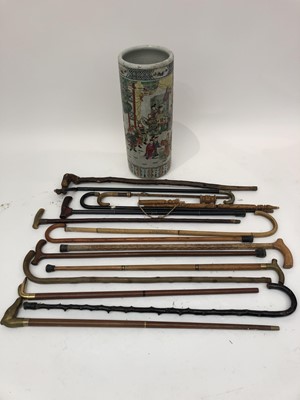Lot 233 - A collection of assorted walking sticks and...