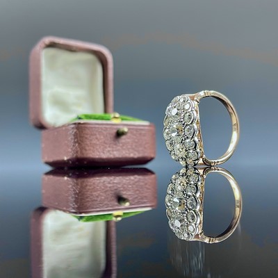 Lot 664 - An 18ct diamond cluster 17 stone ring, the...