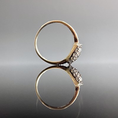 Lot 797 - A 9ct diamond cluster ring, size P, weight 2.63g.