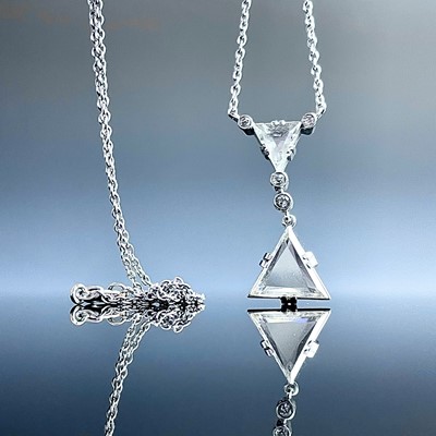 Lot 604 - An early 20th century white gold diamond...