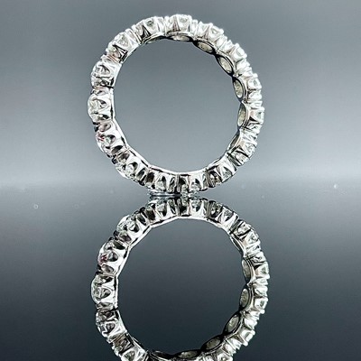 Lot 783 - An 18ct white gold diamond full eternity 15...
