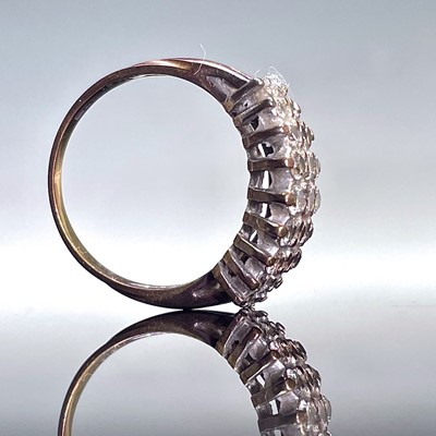 Lot 525 - A 9ct gold diamond set cluster ring, set with...
