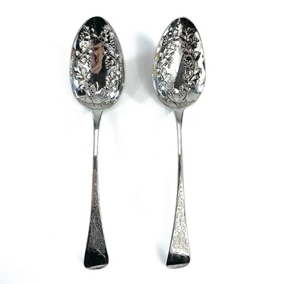 Lot 51 - A pair of George III silver berry spoons by...