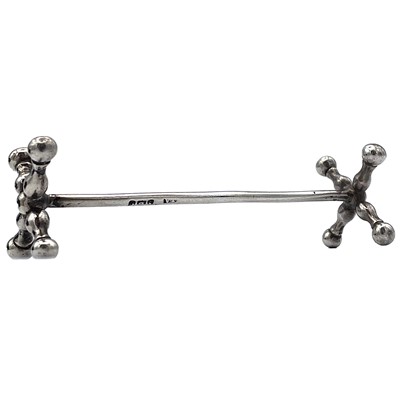 Lot 85 - A George III silver knife rest, possibly by...