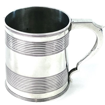 Lot 13 - A George III silver cylindrical mug with two...