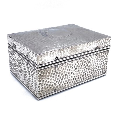 Lot 189 - An Edwardian silver Arts & Crafts cigarette...
