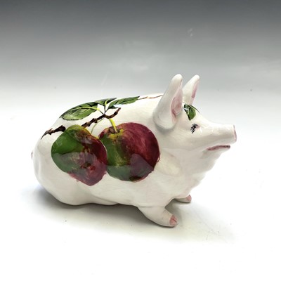 Lot 811 - A Wemyss Exon figure of a pig, painted with...