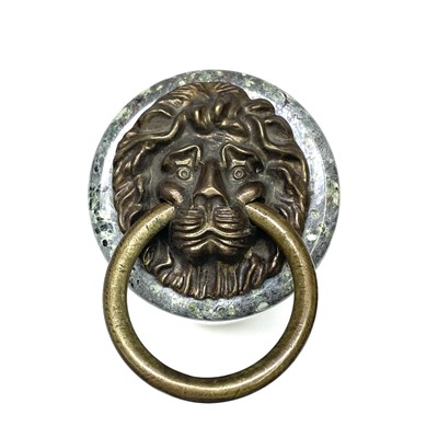 Lot 49 - A Cornish serpentine doorstop, of turned...