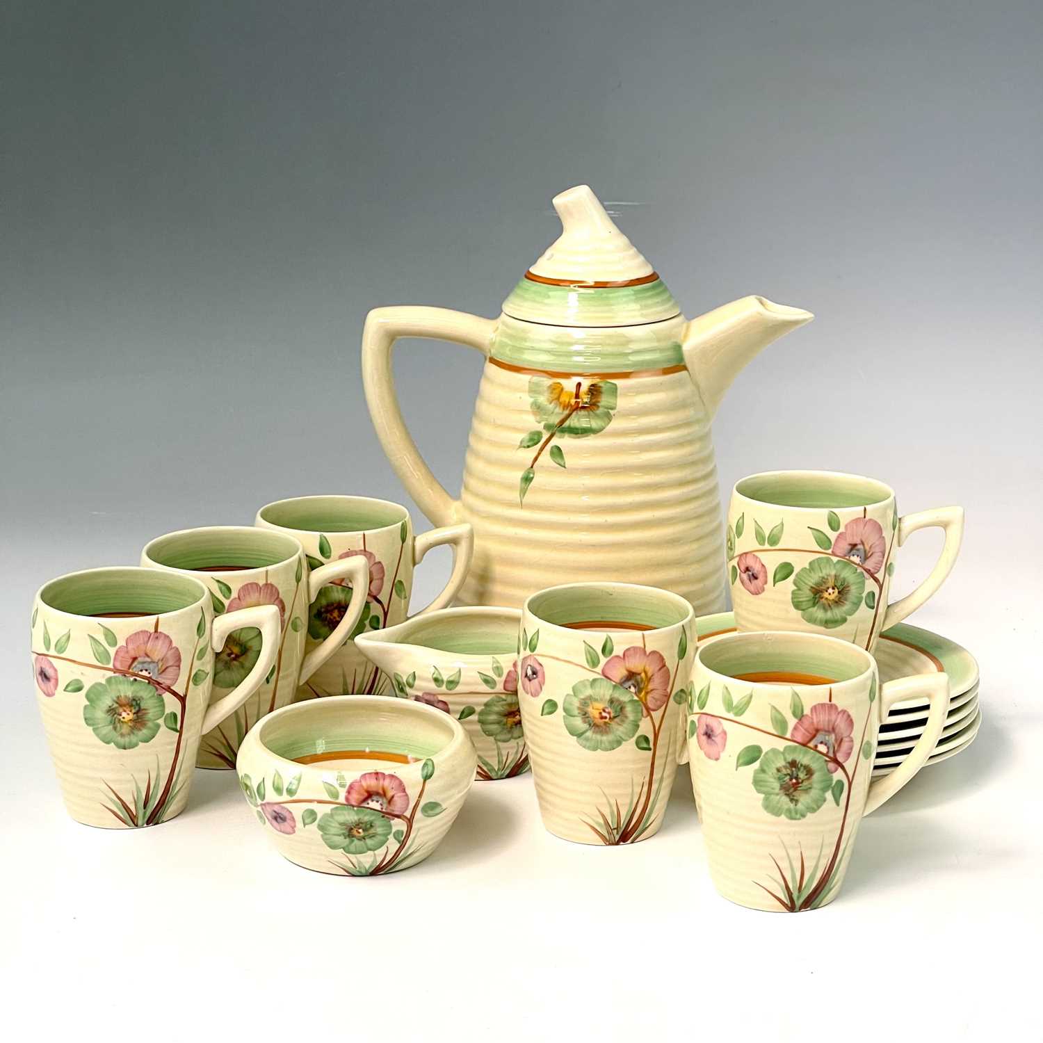 Lot 821 - A Clarice Cliff Lynton shape coffee set,